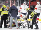  ?? Sean Kilpatrick ?? Panthers forward Vincent Trocheck gets taken off the ice after being injured against the Senators on Monday in Ottawa, Ontario.The Canadian Press