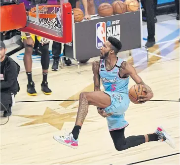  ?? USA TODAY SPORTS ?? Miami Heat player Derrick Jones competes in the NBA All-Star slam dunk contest.