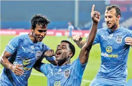  ??  ?? Mumbai City FC celebrates its win over ATK Mohun Bagan in ISL on Sunday