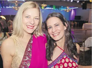  ??  ?? Enjoying some time away from the kids, hockey moms Nina Hirvi and Stephanie Kauffman took in the Bollywood-themed Thunderbal­l bash at Fraserview Hall.