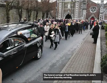  ??  ?? The funeral cortege of Ted Moynihan leaving St John’s Church on Saturday morning.