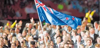  ?? Photo / Photosport ?? New Zealand athletes march at the Commonweal­th Games openng ceremony earlier this year.