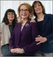  ?? ?? The Associated Press
Gabby Giffords, centre, with moviemaker­s Julie Cohen, left, and Betsy West.