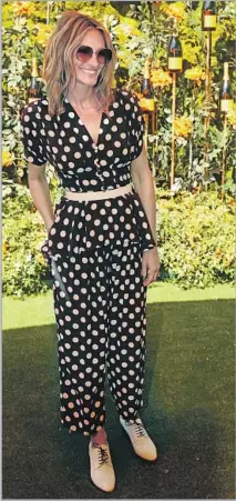  ?? Photograph­s by Dania Maxwell Los Angeles Times ?? JULIA ROBERTS at the 10th Polo Classic at Will Rogers Park, in polka-dot outfit reminiscen­t of her “Pretty Woman” dress.