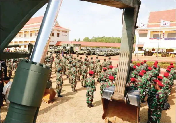  ?? MECH DARA/PHOTO BY HENG CHIVOAN ?? THE Royal Cambodian Armed Forces yesterday took official receipt of 208 military vehicles, 14 pieces of engineerin­g equipment, and other spare parts donated by South Korea’s defence ministry, gear Cambodia’s defence minister said would help stop...