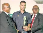  ??  ?? BATTING STAR: Gionne Koopman, centre, received a ‘one-day competitio­n centuries’ award from Border president and CEO. Koopman scored 126 not out off 119 balls against North West