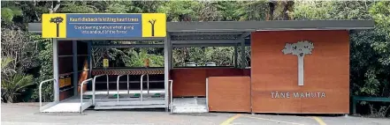  ??  ?? A Department of Conservati­on cleaning station outside Waipoua Forest. It is vital people clean footwear and gear before entering a kauri forest.