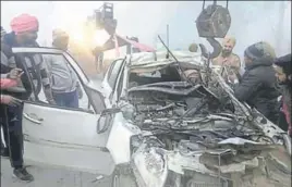  ?? SANJEEV KUMAR/HT ?? ■ The mangled remains of the Ritz car which met with an accident on the Bathinda-Barnala road on Friday morning.