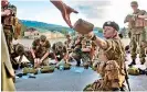  ??  ?? A female army recruit attends a base training with male recruits at the armoured battalion in Setermoen.
AFP