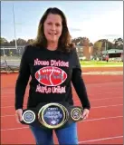  ??  ?? Renee Tarrant shows off the Cabot Panther Bowl title belt given to the winner of the football game between Cabot South and Cabot North.