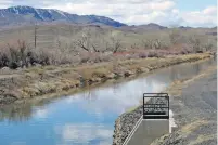  ?? SCOTT SONNER/ASSOCIATED PRESS FILE PHOTO ?? Water is shown in an irrigation canal in Fernley, Nev. near Reno in 2021. A U.S. appeals court has breathed new life into a rural Nevada’s town’s unusual bid to halt government repairs to an aging, federal irrigation canal.