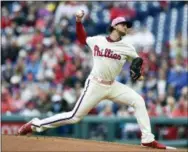  ?? DERIK HAMILTON — THE ASSOCIATED PRESS ?? Phillies starting pitcher Aaron Nola uncorks a pitch in the first inning Sunday against the New York Mets.