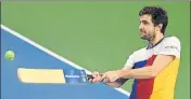  ?? AFP PHOTO ?? After winning the title, Gilles Simon smashes balls into the stands.