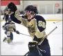  ?? PETE BANNAN — MEDIANEWS GROUP ?? West Chester Rustin’s Alex Crook reacts after he scored, putting the Golden Knights up 2-0, against Unionville in Flyers Cup action at Ice Line Wednesday night.