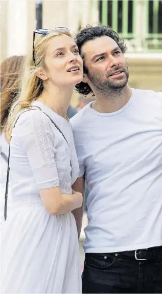  ??  ?? Dating for months...Turner and Caitlin FitzGerald enjoy a romantic break in Paris