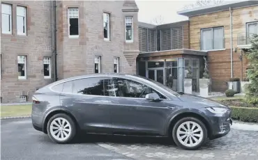  ??  ?? 0 Fonab Castle is among a growing number of destinatio­ns with dedicated Tesla charging points