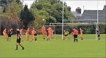  ??  ?? An incoming cross is deflected off a player’s head in an Irvine attempt at goal.