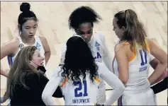  ?? CHARLIE RIEDEL — THE ASSOCIATED PRESS ?? UCLA head coach Cori Close talks to her players during Wednesday’s loss to Texas in the second round of the women’s NCAA Tournament in San Antonio.