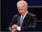  ?? PATRICK SEMANSKY/AP ?? Former Vice President Joe Biden checks his watch during the second and final presidenti­al debate Thursday.