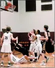  ?? MIKE CAPSHAW/ ENTERPRISE-LEADER ?? Prairie Grove guard Anthony Johnson (1) falls to the floor while looking up to see if his shot fell during a game with Inola (Okla.) on Dec. 31.