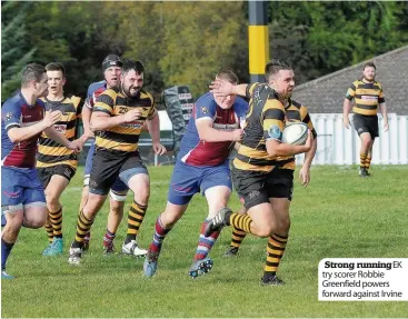  ??  ?? try scorer Robbie Greenfield powers forward against Irvine