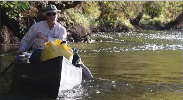  ?? (Arkansas Democrat-Gazette/Bryan Hendricks) ?? Proper paddling technique ensures fun and safe canoeing in almost all moving waters in Arkansas.