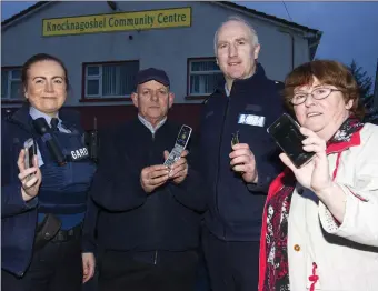  ?? Photo by John Reidy ?? Sgt. Paula Kelleher pictured with Pat Griffin, Garda John Enright and Geraldine Griffin at the launch of the Knocknagos­hel Garda / Community Text System on Sunday evening.