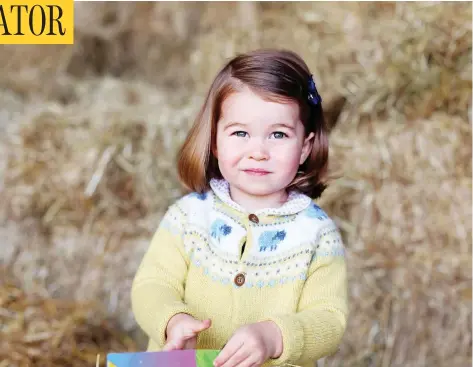  ?? AGENCE FRANCE-PRESSE PHOTO / KENSINGTON PALACE / THE DUCHESS OF CAMBRIDGE ?? A picture released by Kensington Palace and Britain’s Duke and Duchess of Cambridge shows Princess Charlotte of Cambridge at Anmer Hall in the village of Anmer in Norfolk, eastern England, in April, in advance of her second birthday on Tuesday. The...