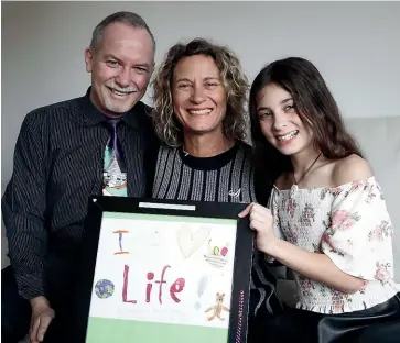  ?? MARTIN DE RUYTER/STUFF ?? Nelson songwriter­s Doug Stenhouse and Kath Bee, centre, win best song at the 2020 Children’s Music Awards for I Love Life, featuring Joelle Noar, right.