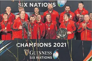  ??  ?? Wales captain Alun Wyn Jones got his hands on the Six Nations trophy yesterday