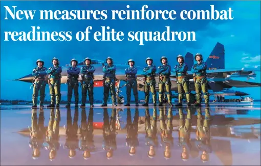  ?? PHOTOS BY YANG PAN / FOR CHINA DAILY ?? Pilots from an elite fighter jet squadron of the People’s Liberation Army Air Force assemble on the tarmac after a training drill. Ding Tang,