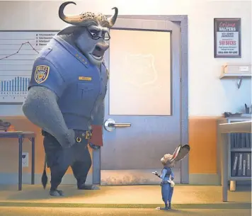  ?? DISNEY ?? Chief Bogo of the Zootopia Police Department (voiced by Idris Elba) doesn’t think much of his rookie cop Judy Hopps (Ginnifer Goodwin).