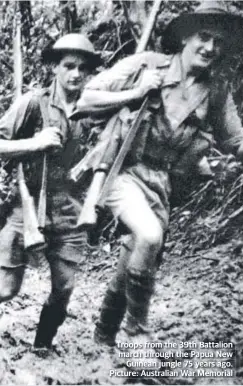  ??  ?? Troops from the 39th Battalion march through the Papua New Guinean jungle 75 years ago. Picture: Australian War Memorial