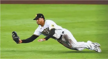  ?? DENIS POROY GETTY IMAGES ?? CF Trent Grisham beat out the Dodgers’ Cody Bellinger and the Braves’ Ronald Acuña Jr. for the Gold Glove.