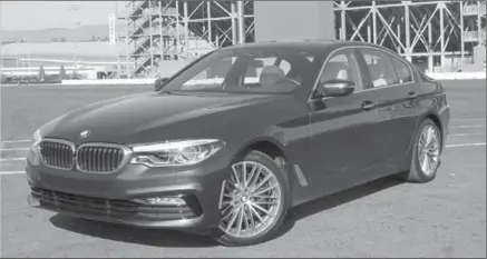  ??  ?? At almost five meters in length, the all-new seventh generation BMW 5 Series (5401 xDrive model shown) boasts industryle­ading technology.