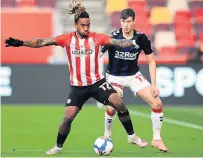  ??  ?? STALEMATE Bees’ Toney y and Boro’s McNair battle for the ball