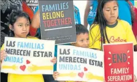  ?? AP FILE ?? ▪ Children protest in front of an immigratio­n and customs enforcemen­t office in Florida.