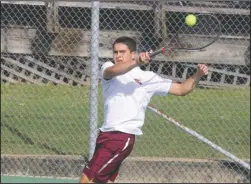  ?? The Sentinel-Record/Richard Rasmussen ?? LONE WOLF: Lake Hamilton’s Jacob Praetzel returns the ball Monday during his first-round match in the Class 5A state tennis tournament against Mark Belt, of Nettleton, at the Hot Springs Country Club.