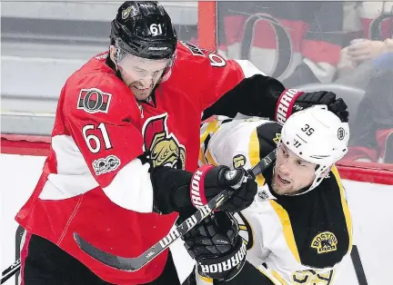  ?? SEAN KILPATRICK/THE CANADIAN PRESS ?? Senators forward Mark Stone battles the Boston Bruins’ Matt Beleskey in Game 1 of their Eastern Conference quarter-final series Wednesday in Ottawa. Stone, one of the team’s offensive leaders, hasn’t found the back of the net since getting injured.