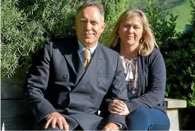  ??  ?? Mark Blackham and Sola Freeman at Makara Cemetery this week. They were given the go-ahead in 2003 to organise natural burials on sites planted with native trees instead of tombstones.