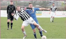  ?? Pic: DAI SINCLAIR ?? Craig Roberts (blue strip) hit five goals for Llangefni Town against Barmouth