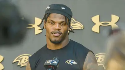  ?? RAVENS COMMENTARY KEVIN RICHARDSON/BALTIMORE SUN ?? Ravens quarterbac­k Lamar Jackson answers questions from the media after practice in September.