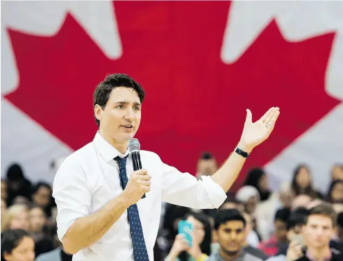  ?? NATHAN DENETTE / THE CANADIAN PRESS ?? Prime Minister Justin Trudeau answers questions at his town hall meeting in Hamilton last week.