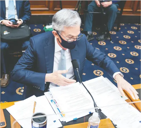  ?? Jim Lo Scalzo - Pool / Gett y Images ?? Federal Reserve Chair Jerome Powell speaks in December at a during a House Financial Services Committee hearing on Oversight of the Treasury Department’s and Federal Reserve’s pandemic response.