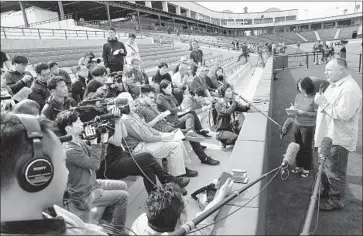  ?? Robert Gauthier Los Angeles Times ?? MIKE SCIOSCIA, talking to reporters at Tempe Diablo Stadium, has 1,570 victories as Angels manager.