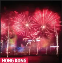  ??  ?? HONG KONG
Dazzling display: Fireworks light up the cityscape