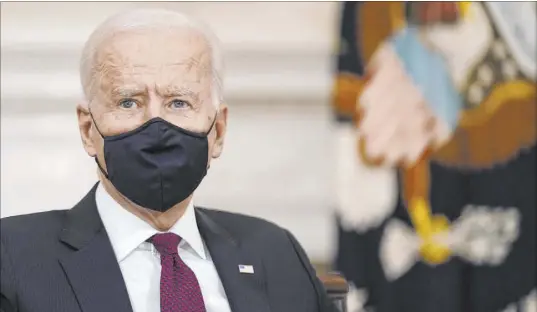  ?? Patrick Semansky The Associated Press ?? President Joe Biden during a roundtable discussion on coronaviru­s relief Friday in the State Dining Room of the White House. Biden is the first president in four decades to reach this point in his term without holding a formal question and answer session.