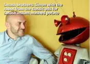  ??  ?? Smash brothers: Simon with the robot from the classic ads for Smash instant mashed potato