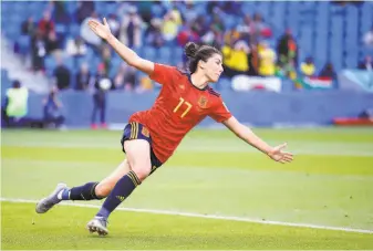  ?? Alex Grimm / Getty Images ?? Spain’s Lucia Garcia celebrates after scoring in the 89th minute of her team's 3-1 win over South Africa on Saturday in a Group B match at Stade Oceane in Le Havre, France.