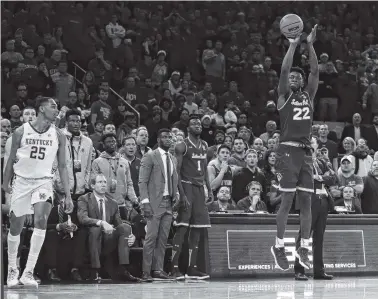  ?? AP PHOTO/NOAH K. MURRAY ?? Kentucky forward PJ Washington watches Seton Hall guard Myles Cale make a 3-point shot in the closing seconds of the overtime period Saturday in the Citi Hoops Classic in New York. Seton Hall won 84-83.